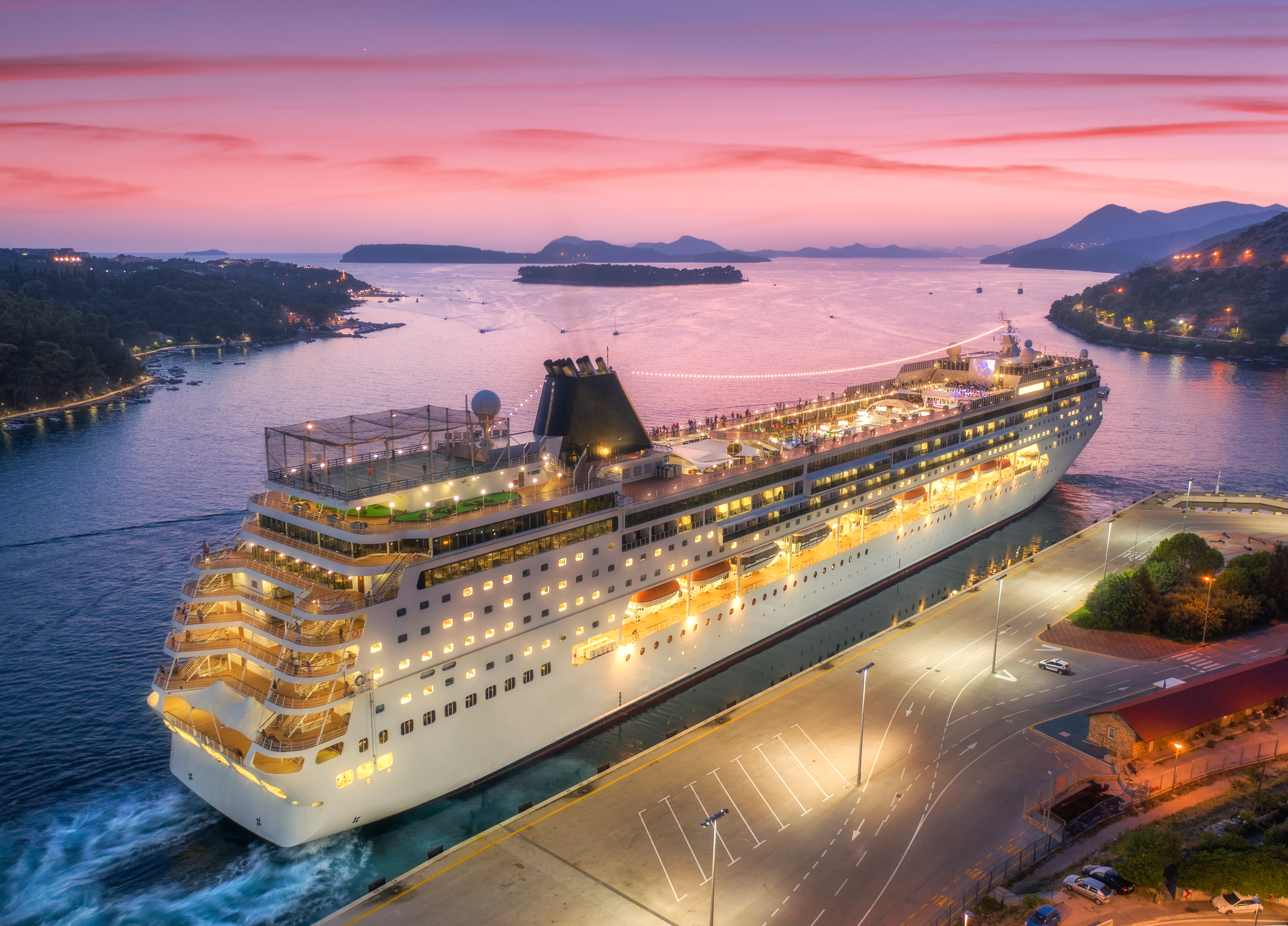 aerial-view-of-cruise-ship-in-port-at-night-in-dub-2021-08-27-09-22-36-utc